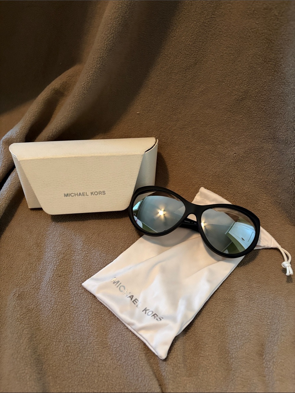 Michael Kors Black Frame Sunglasses with Green-Tinted Lenses